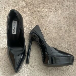 5 1/2 inch black patent leather platform stiletto heels.